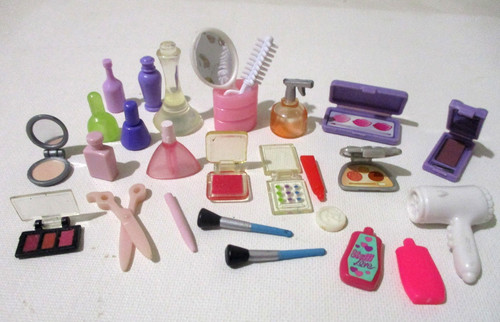 Barbie doll make cosmetics - up,